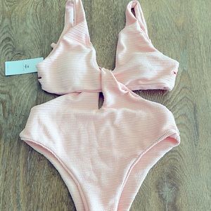 One piece swimsuit with cut outs